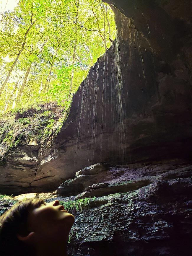 Someone looking out of a cave